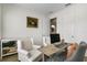 Cozy home office featuring light-filled space, two-toned walls, and stylish furniture at 17668 Passionflower Cir, Clermont, FL 34714