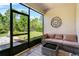A screened-in outdoor patio area perfect for entertaining or relaxing outside at 17668 Passionflower Cir, Clermont, FL 34714