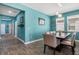 Dining room with tile floors, recessed lights and access to rooms at 1807 Good Neighbor Loop, Kissimmee, FL 34744