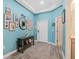 Welcoming foyer featuring a console table, stylish rug, and decorative wall art at 1807 Good Neighbor Loop, Kissimmee, FL 34744