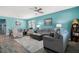 Spacious living room with tile floors, comfortable seating, and ample natural light at 1807 Good Neighbor Loop, Kissimmee, FL 34744