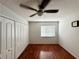 Bright bedroom with beautiful wood floors, natural light, and ample closet space at 2014 Applegate Dr, Ocoee, FL 34761