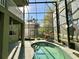 Screen enclosed pool, surrounded by lush landscaping at 2014 Applegate Dr, Ocoee, FL 34761