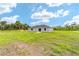 Expansive backyard with well-maintained lawn, ideal for recreation and enjoying nature at 20661 Sw Marine Blvd, Dunnellon, FL 34431