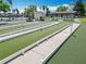 Well-maintained bocce ball courts, a community feature for recreation and socializing at 2124 Westchester Way, The Villages, FL 32162