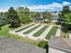 Aerial view of bocce ball courts, a recreational amenity surrounded by landscaping and seating at 2124 Westchester Way, The Villages, FL 32162