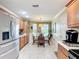 Charming breakfast nook, offering ample natural light and a welcoming atmosphere at 2124 Westchester Way, The Villages, FL 32162