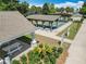 Aerial view showcasing a shaded picnic area and bocce ball courts in the community at 2124 Westchester Way, The Villages, FL 32162
