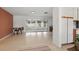 This expansive living room offers seamless flow into an enclosed patio and is bathed in natural light at 2240 Archer Blvd, Orlando, FL 32833