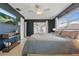 Comfortable main bedroom featuring windows, sleek flooring, and contemporary furnishings at 2240 Archer Blvd, Orlando, FL 32833
