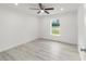 Bright bedroom featuring a ceiling fan, recessed lights and an exterior view from the window at 23810 Sw Indian Hill Dr, Dunnellon, FL 34431
