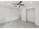 Bedroom features a closet, ceiling fan and recessed lights at 23810 Sw Indian Hill Dr, Dunnellon, FL 34431