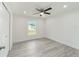 Bedroom with a ceiling fan, recessed lights and wood flooring at 23810 Sw Indian Hill Dr, Dunnellon, FL 34431