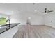 Spacious open concept with vaulted ceiling and wood-look floors at 23810 Sw Indian Hill Dr, Dunnellon, FL 34431