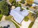 Aerial view of a single-Gathering home featuring a screened in back patio and a gray tile roof at 257 Donegal Ct, Altamonte Springs, FL 32714
