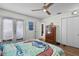 Bedroom with ceiling fan, closet and french doors at 257 Donegal Ct, Altamonte Springs, FL 32714