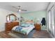 bedroom with a ceiling fan and laminate flooring with vibrant accents for playful, cozy atmosphere at 257 Donegal Ct, Altamonte Springs, FL 32714