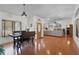 This dining area features hardwood floors, and a view of the home's foyer and living room at 257 Donegal Ct, Altamonte Springs, FL 32714