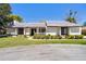 Well maintained one story home with manicured lawn, charming picket fence, and beautifully landscaped front yard at 257 Donegal Ct, Altamonte Springs, FL 32714