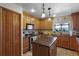 Updated kitchen featuring an island, custom cabinets, and stainless steel appliances at 257 Donegal Ct, Altamonte Springs, FL 32714