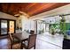 Spacious patio featuring a table with seating, and opens up to an outdoor living area with lush greenery at 257 Donegal Ct, Altamonte Springs, FL 32714