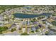 Aerial view showcasing the community with ponds and many single Gathering homes at 2723 Callaway Ln, Kissimmee, FL 34744