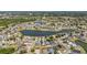 Aerial view showcasing the community with ponds and many single Gathering homes at 2723 Callaway Ln, Kissimmee, FL 34744