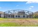 Spacious backyard featuring an enclosed pool area at 2723 Callaway Ln, Kissimmee, FL 34744