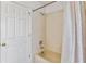 Clean bathroom featuring a shower and tub at 2723 Callaway Ln, Kissimmee, FL 34744
