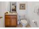 Bathroom with a single sink vanity and a standard toilet at 2723 Callaway Ln, Kissimmee, FL 34744