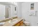 Bright bathroom with shower, toilet, vanity and decorative accents at 2723 Callaway Ln, Kissimmee, FL 34744