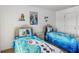 bedroom with twin beds, 'Frozen' theme, and bright decor at 2723 Callaway Ln, Kissimmee, FL 34744