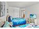 bedroom with twin beds, 'Frozen' theme, and bright decor at 2723 Callaway Ln, Kissimmee, FL 34744
