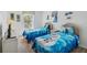bedroom with twin beds, 'Frozen' theme, and bright decor at 2723 Callaway Ln, Kissimmee, FL 34744