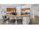 Spacious kitchen featuring modern appliances, ample counter space, and stylish breakfast bar at 2723 Callaway Ln, Kissimmee, FL 34744