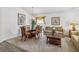 Comfortable living room featuring neutral tones, elegant furnishings, and ample seating at 2723 Callaway Ln, Kissimmee, FL 34744