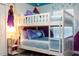 This playful ' bedroom features a white bunk bed and Frozen-themed decor on the walls at 2964 Protagonist St, Kissimmee, FL 34746
