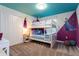 themed bedroom with bunk beds, vibrant colors, and themed wall decor at 2964 Protagonist St, Kissimmee, FL 34746