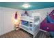 Charming themed bedroom features Frozen decor, bunk beds, and fun accents at 2964 Protagonist St, Kissimmee, FL 34746