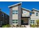 Charming two-story home with modern architectural design and stone accents at 2964 Protagonist St, Kissimmee, FL 34746