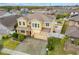Gorgeous aerial view of the home showcasing the pristine landscaping and neighborhood at 3087 Somerset Park Dr, Orlando, FL 32824