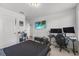 Comfortable bedroom with a dedicated workspace, ideal for productivity at 3087 Somerset Park Dr, Orlando, FL 32824