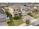 Charming two-story house boasts a two-car garage, well-maintained lawn, and tasteful landscaping at 3087 Somerset Park Dr, Orlando, FL 32824