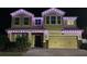 Charming two story home featuring a brick paver driveway and front yard at 3087 Somerset Park Dr, Orlando, FL 32824