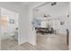 Cozy living room featuring modern decor and plush seating next to a conveniently located half bathroom at 3087 Somerset Park Dr, Orlando, FL 32824