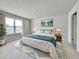 Bright bedroom with large window, plush carpet, and a comfortable king-size bed with side tables at 3954 Great Smokey Way, Apopka, FL 32712
