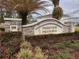 The stone entrance sign for Parkview Preserve is surrounded by lush landscaping, adding to its appeal at 3954 Great Smokey Way, Apopka, FL 32712