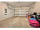 Empty garage space with concrete walls and floor, and some toys on the right at 3954 Great Smokey Way, Apopka, FL 32712