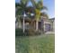 A lovely home with stone accents and a two-car garage has beautiful landscaping at 4036 Parkhouse Dr, Orlando, FL 32824