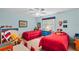 Playful bedroom with twin beds, bright colors, and whimsical decor at 420 Wild Oak Cir, Longwood, FL 32779